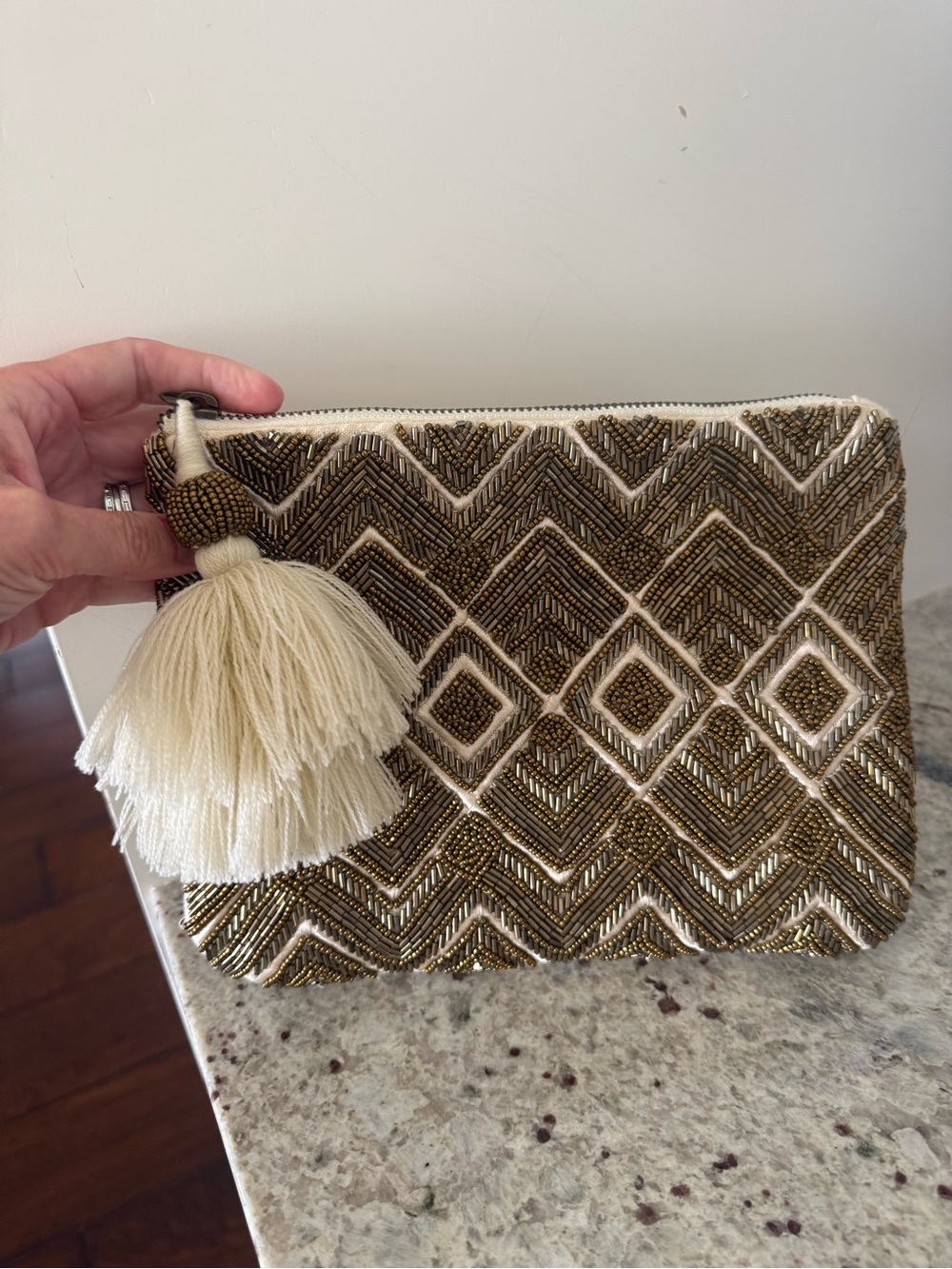 Universal Thread Beaded Chevron Tassel Clutch in Cream and Gold/bronze